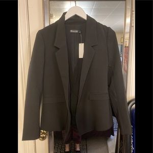 Black buttonless blazer